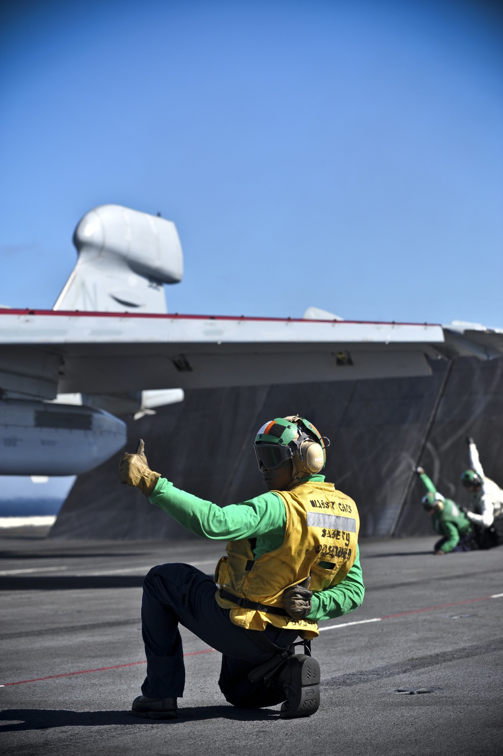 USS Nimitz crew works aboard flight deck