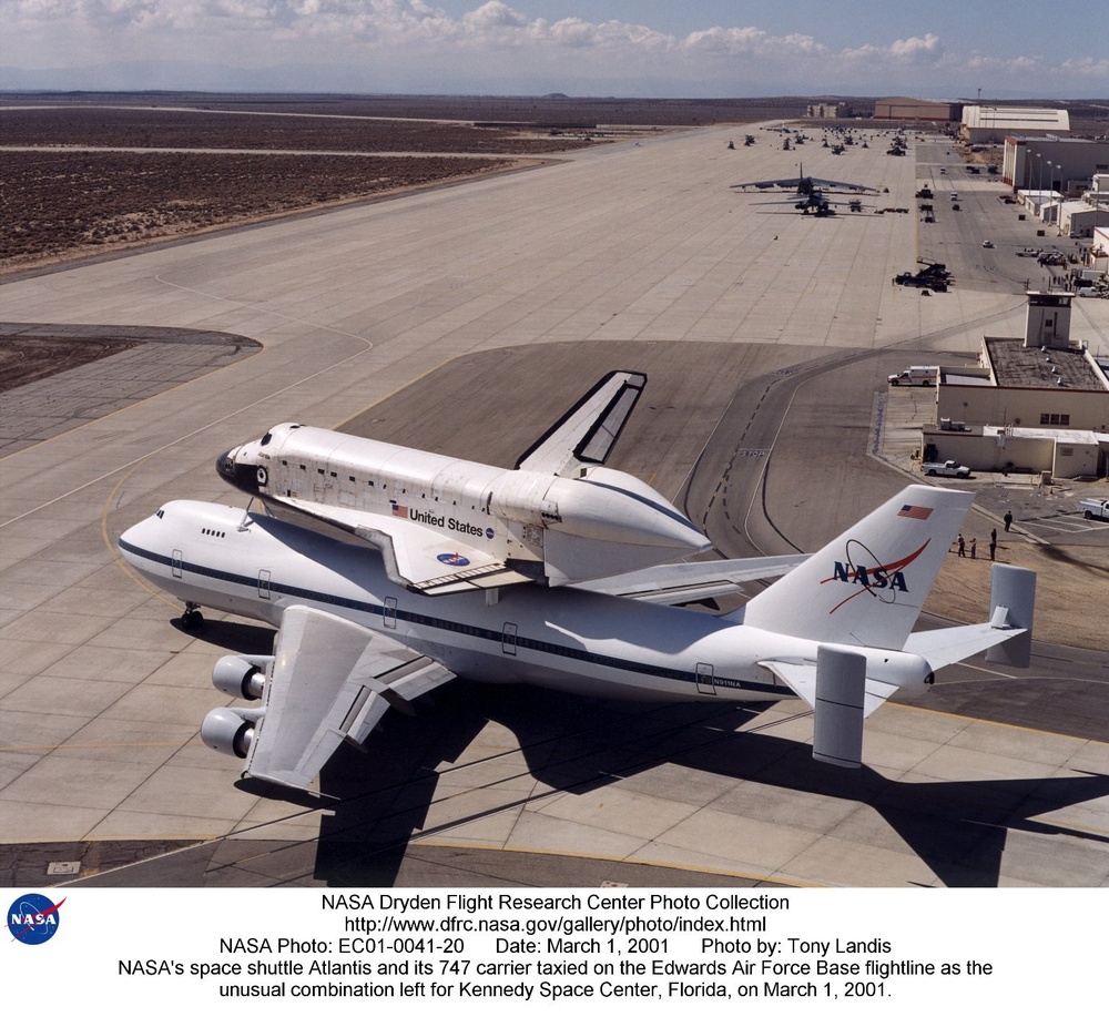 NASA's space shuttle Atlantis and its 747 carrier taxied on the Edwards Air Force Base flightline as