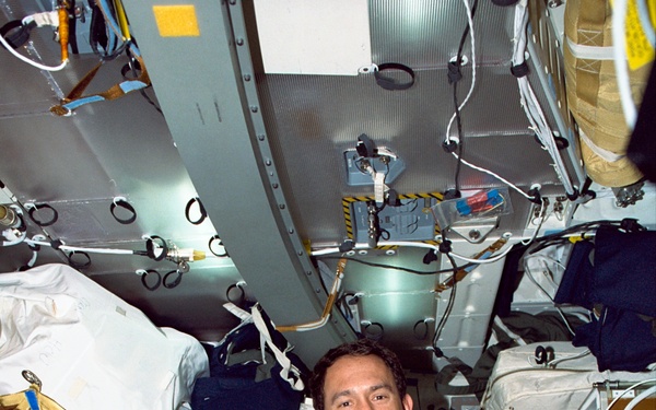 Various views of the STS-88 crew on the flight deck and middeck