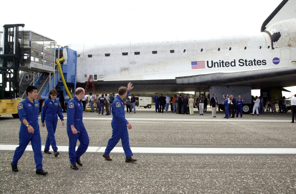 View of the STS-108 crew on the runway after the landing of Endeavour at KSC