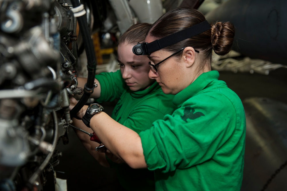 USS Nimitz sailors at work