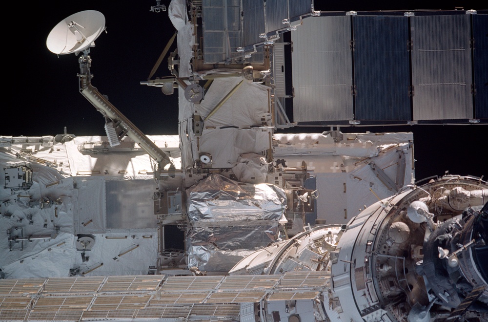 View of the aft nadir side of the P6 Truss, S0 Truss and Zvezda taken during STS-110