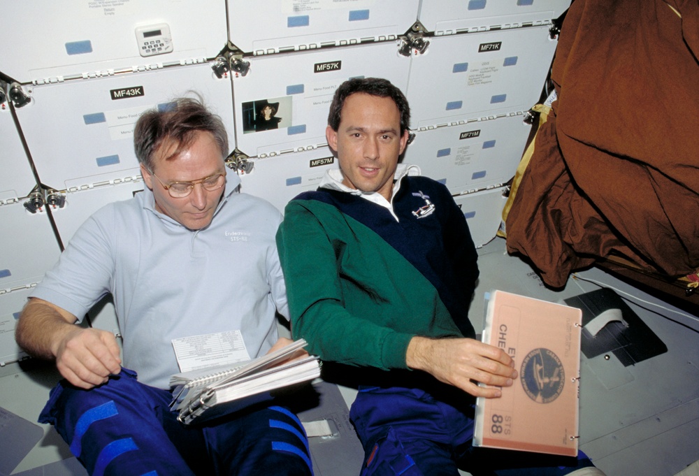 Various views of the STS-88 crew on the Endeavours middeck