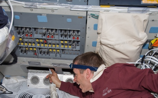 View of Pilot Gregory C. Johnson during IFM on the Flight Deck
