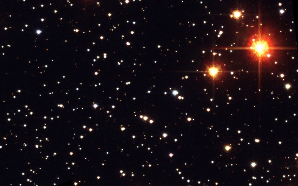 Hubble Identifies Stellar Companion to Distant Planet