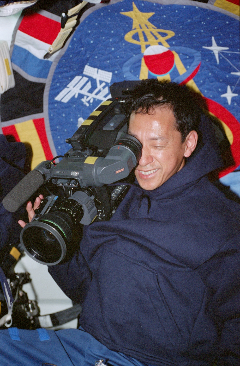 STS-99 MS Mohri operates the HD camera on OV-105's middeck