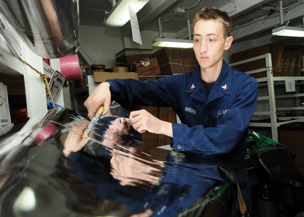 USS Nimitz crew performs duties aboard ship