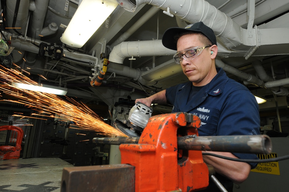 USS Nimitz crew performs duties aboard ship