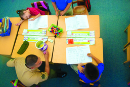 VMA-214 kicks off school year by volunteering at one