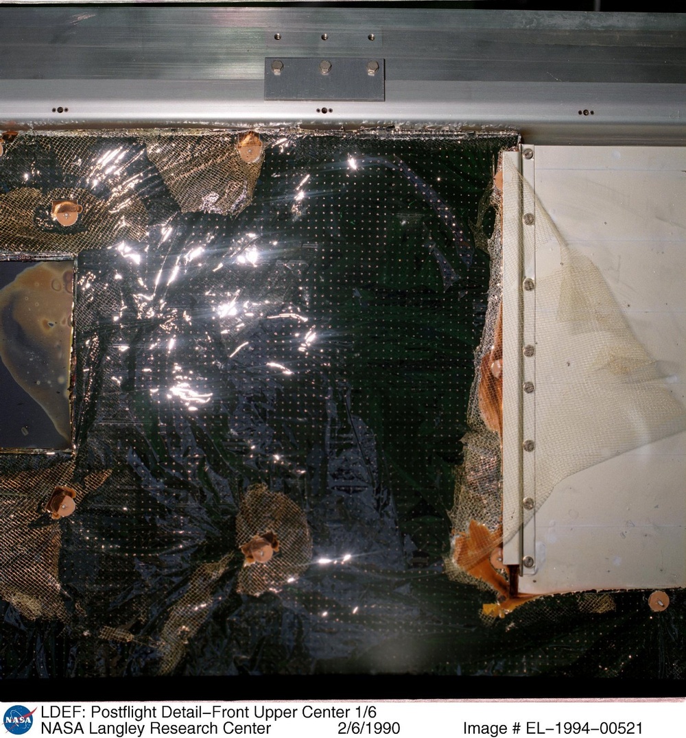 LDEF: Postflight Detail-Front Upper Center 1/6