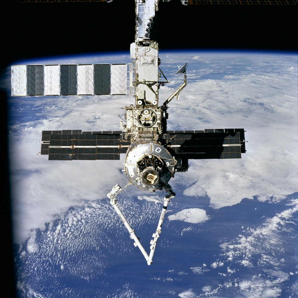 Forward view of the ISS taken during the final flyaround of the STS-100 mission