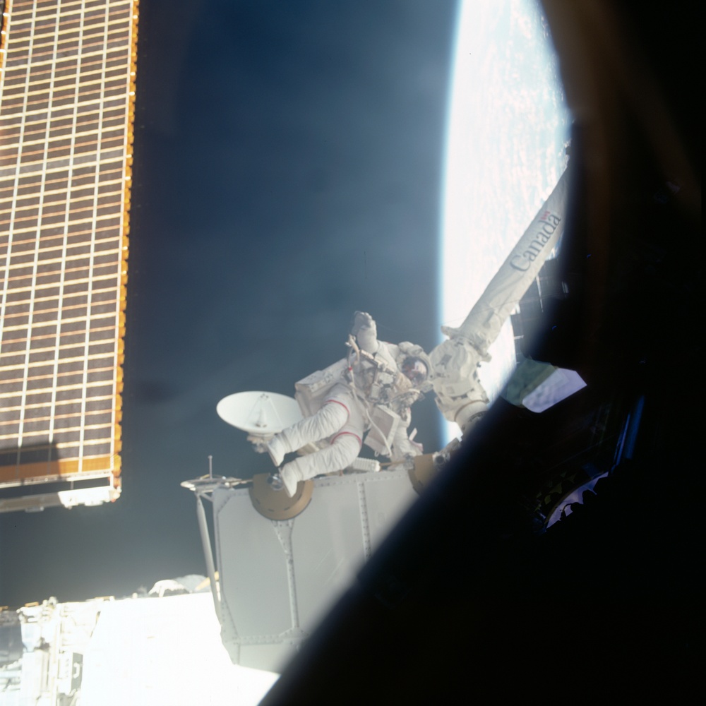 MS Hadfield works on the SLP during the second EVA of STS-100