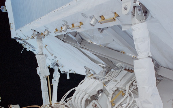 View of the aft avionics tray between the Z1 and S0 Trusses taken during the fourth EVA of STS-110