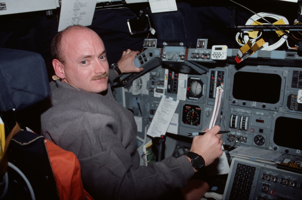 Various views of the STS-103 crew on the flight deck