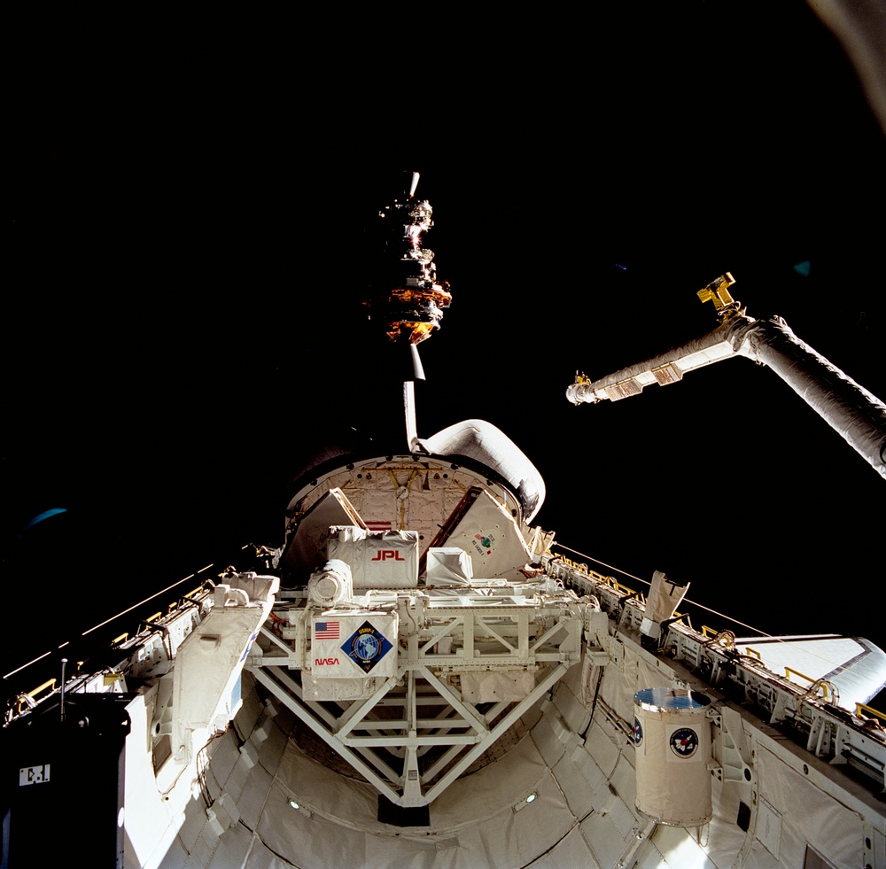 STS-52 deployment of LAGEOS/IRIS spacecraft from OV-102's payload bay