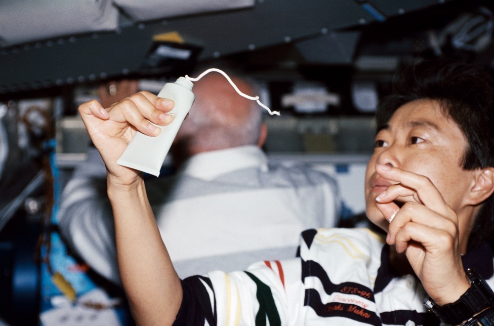 Various views of activities with the STS-95 crew on the middeck