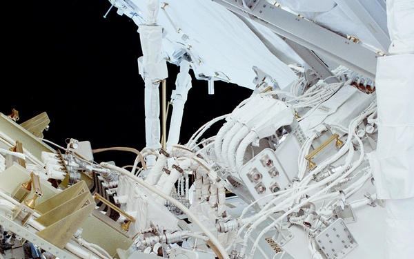 View of the aft avionics tray between the Z1 and S0 Trusses taken during the fourth EVA of STS-110