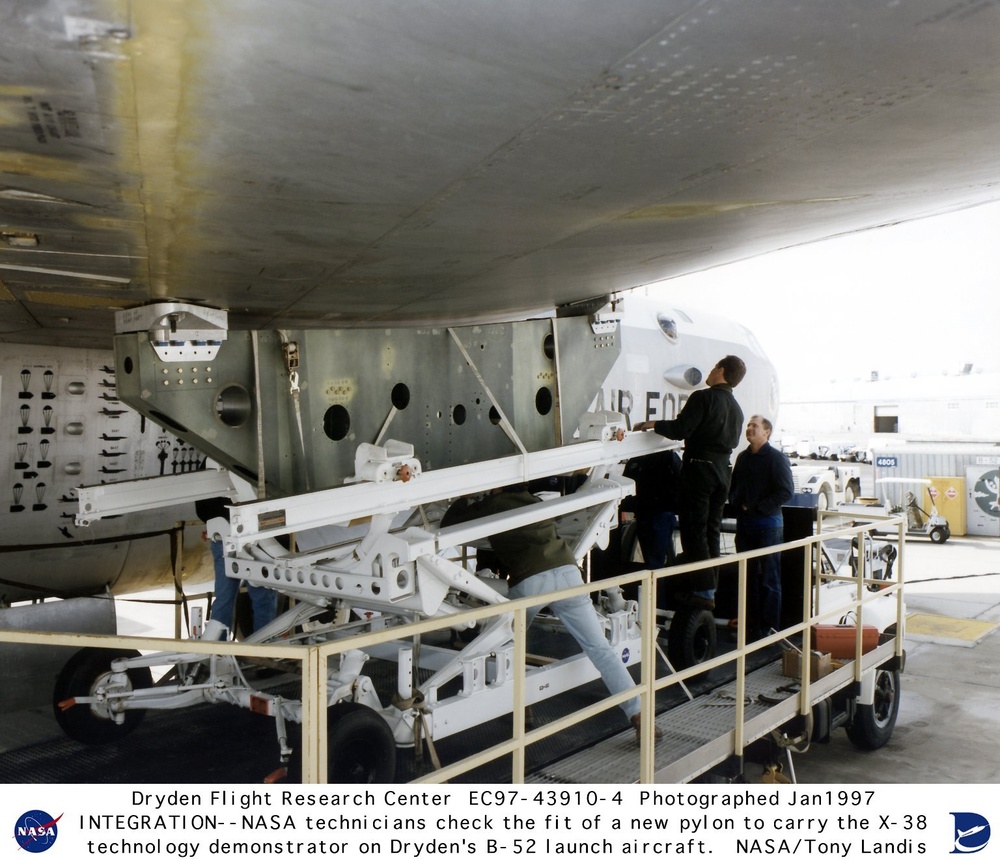 Close-up of Wing Fit Check of Pylon to Carry the X-38 on B-52 Launch Aircraft