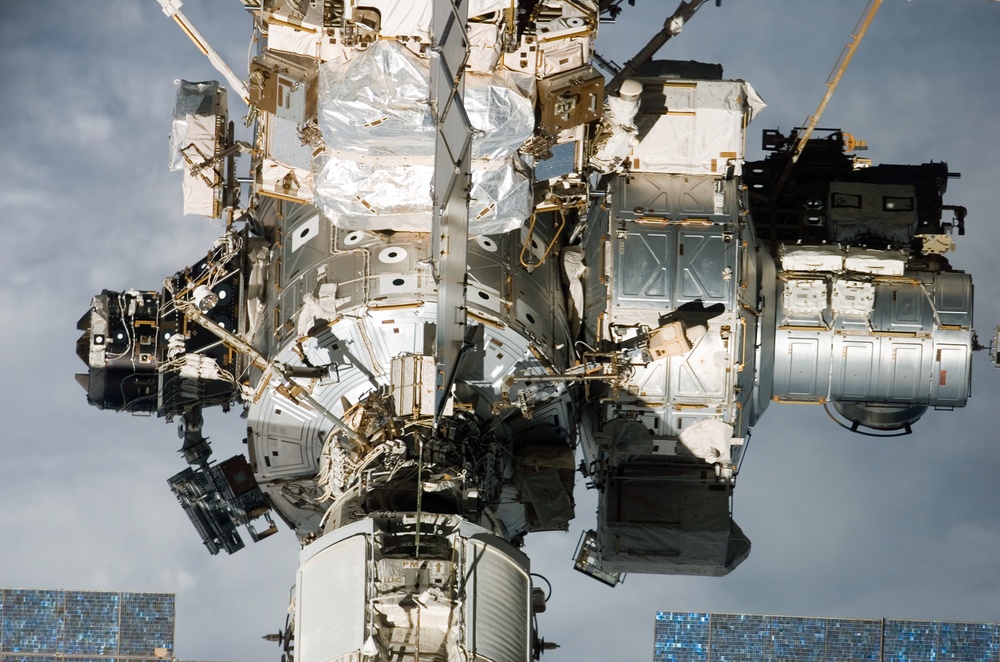 Flyaround view of the zenith and aft sides of the PMA-3, Z1 Truss, A/L, and Node 1