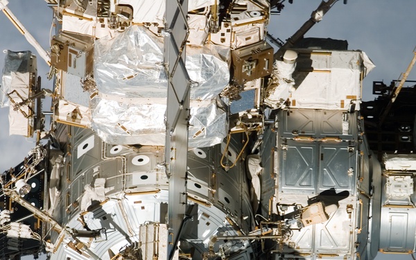 Flyaround view of the zenith and aft sides of the PMA-3, Z1 Truss, A/L, and Node 1