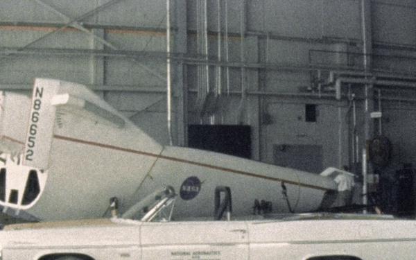 M2-F1 in hangar with Pontiac tow vehicle