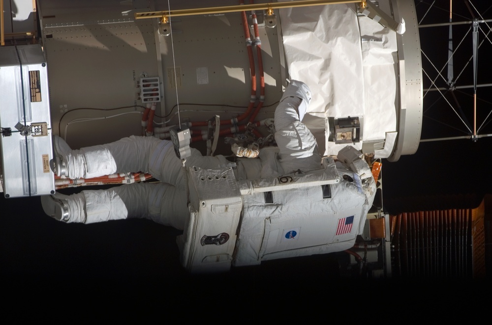 Olivas at the P6 Truss STBD 2B SAW during retract operations on EVA 3