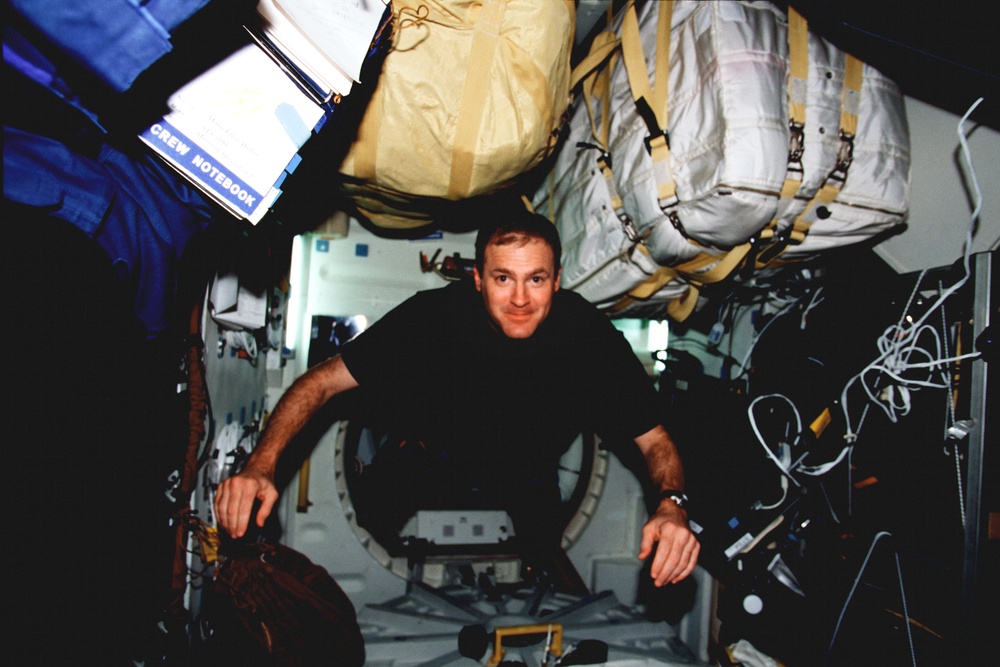 CDR Halsell flying on the middeck
