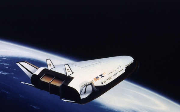 X-33 by Lockheed Martin above Earth - Computer Graphic