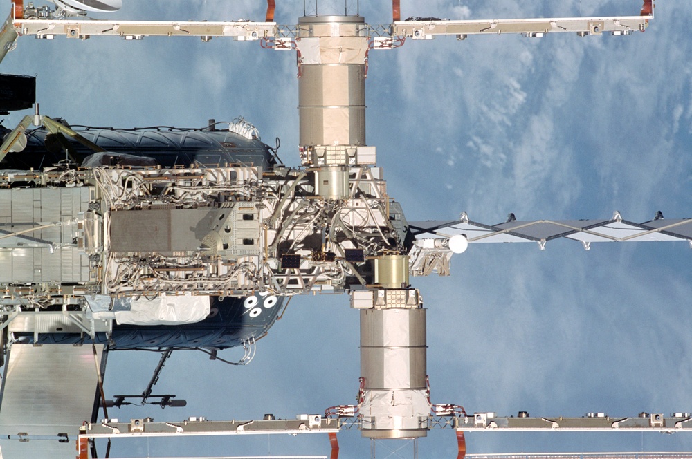 Exterior view of ISS during flyaround by STS-105 showing P6 truss