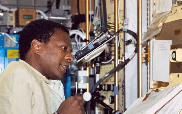 Brown works at the CM-2 in the Spacehab RDM during STS-107