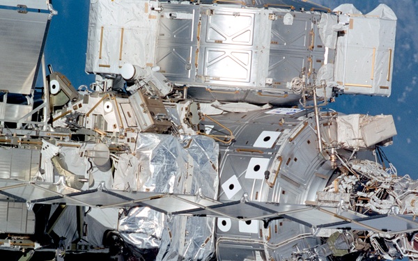 Exterior view of ISS during flyaround by STS-105 showing Z1 truss and Node 1