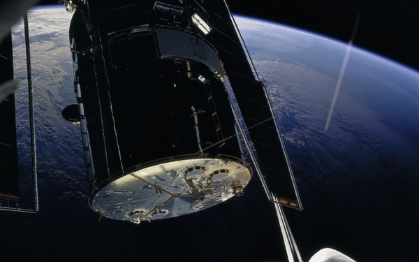 Various views during the deployment of the HST