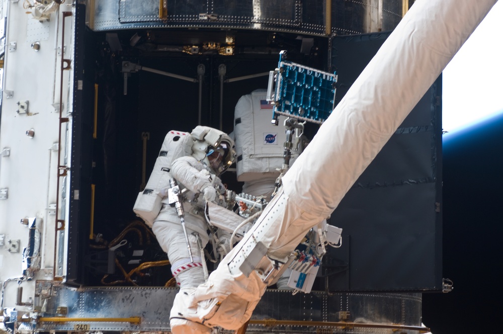 STS-125 MS1 Good and MS4 Massimino during EVA4