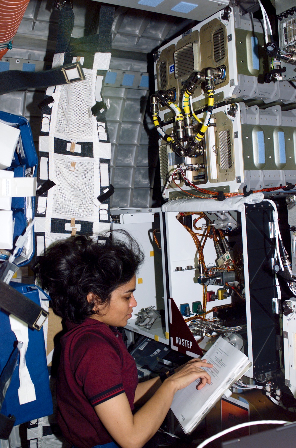 Chawla works at the MGM experiment in the Spacehab RDM during STS-107