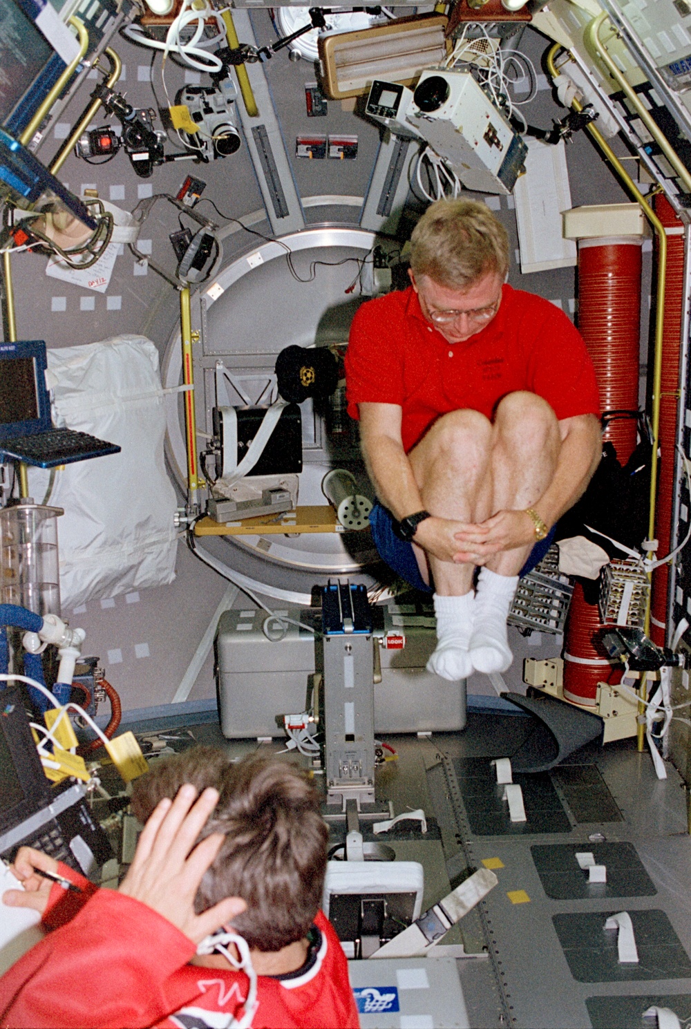 Crewmember activity in the Spacelab module