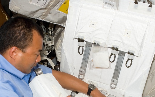 Soichi Noguchi with tool kit