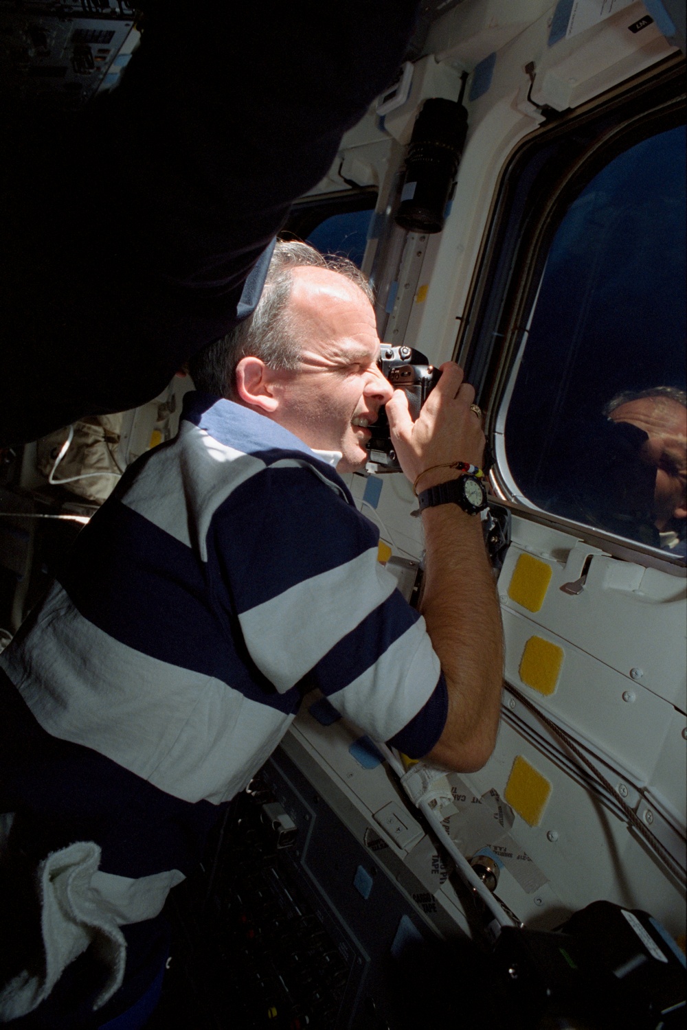 STS-101 crew on aft flight deck during docking