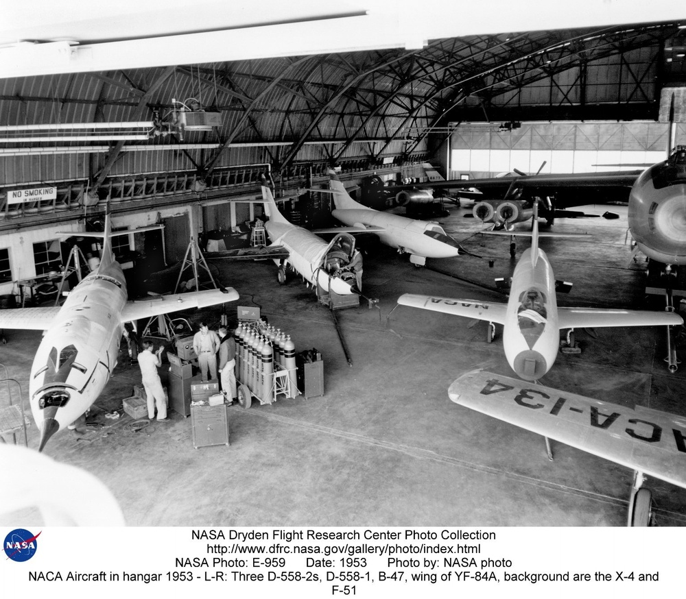 NACA Aircraft in hangar 1953 - L-R: Three D-558-2s, D-558-1, B-47, wing of YF-84A, background are th