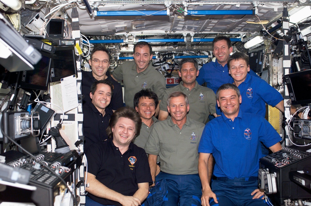Expedition Four, STS-111 UF-2, Expedition Five crews group portrait in U.S. Lab