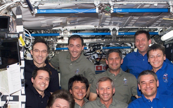 Expedition Four, STS-111 UF-2, Expedition Five crews group portrait in U.S. Lab