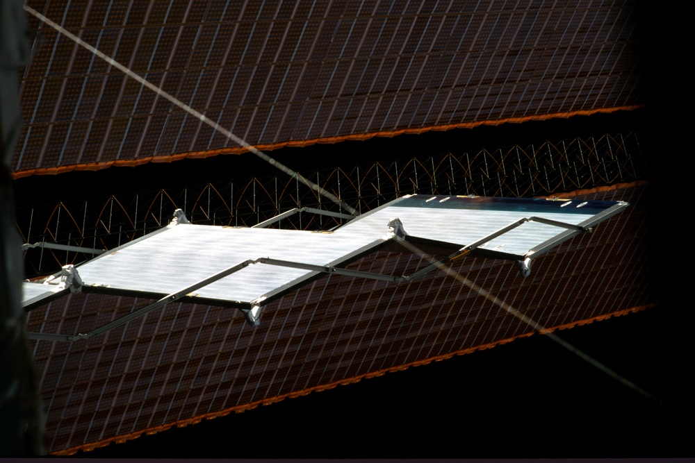 Extended radiator and solar array on the ISS