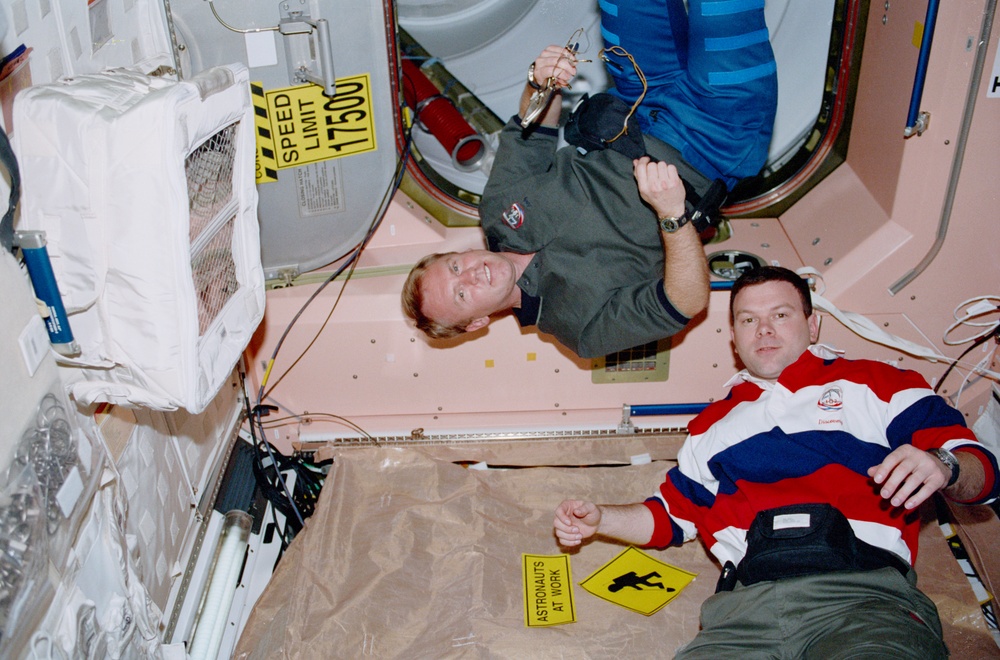 STS-102 crewmember activity in the ISS