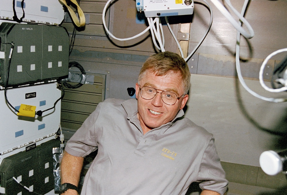 Crewmember activity in the shuttle middeck