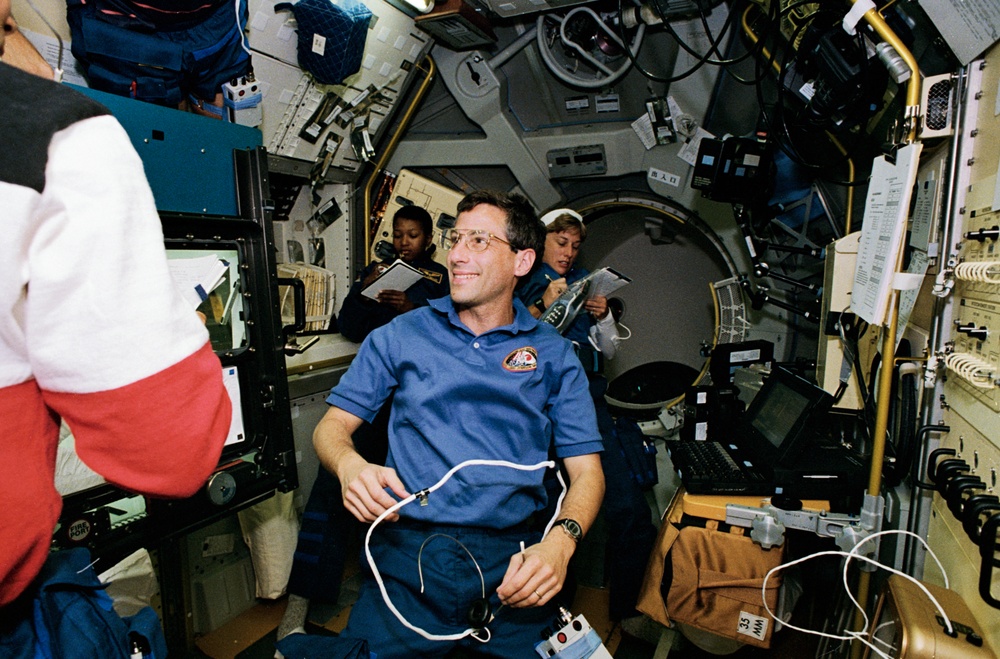 Various shots of crew during changeover in Spacelab-Japan (SLJ)