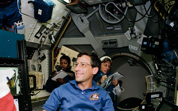 Various shots of crew during changeover in Spacelab-Japan (SLJ)