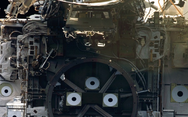 View of the forward side of the Z1 Truss taken during STS-110