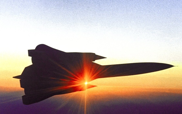 YF-12C in flight at sunset