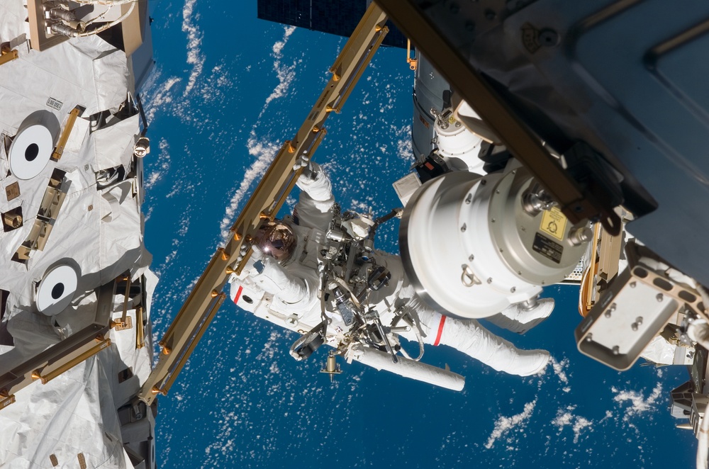 STS-116 MS Curbeam,Jr.,works at the S0 Truss during EVA 1