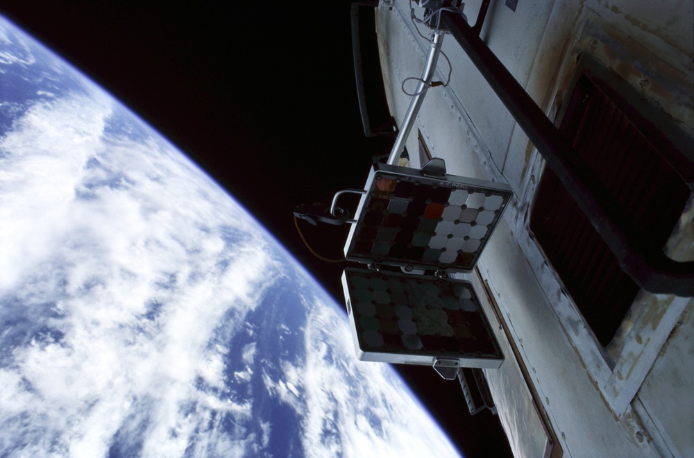Kromka experiment situated near a SM thruster taken during Expedition Four EVA 2