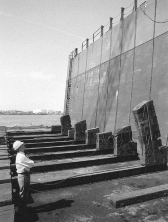 Caddell president Steve Kalil inspects dry dock.